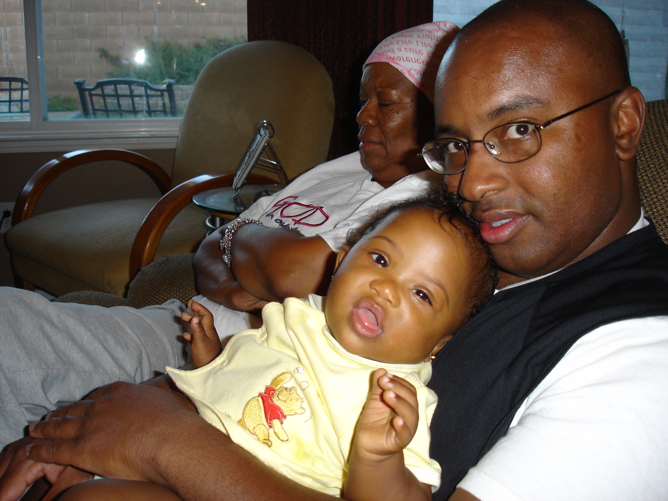Percy Herold with baby Azaria.